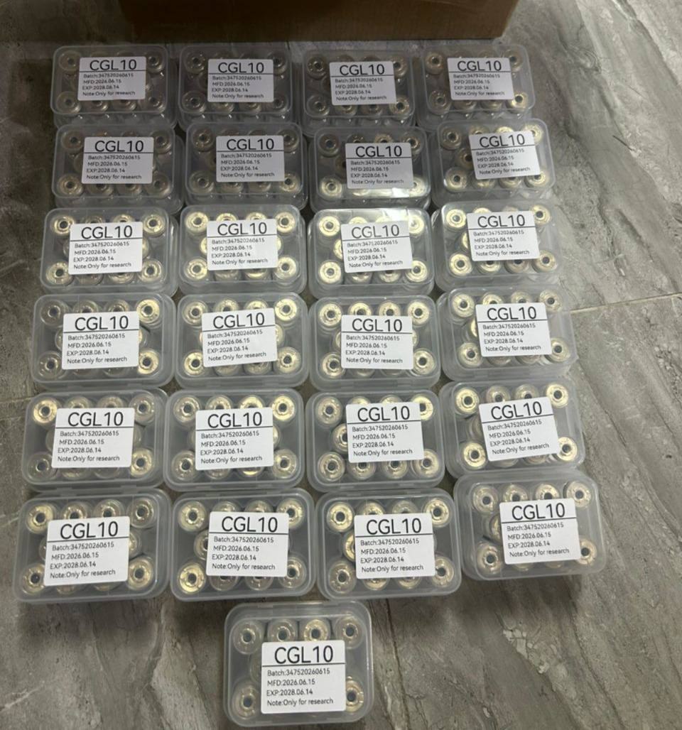 Large batch of identically labelled product trays arranged together